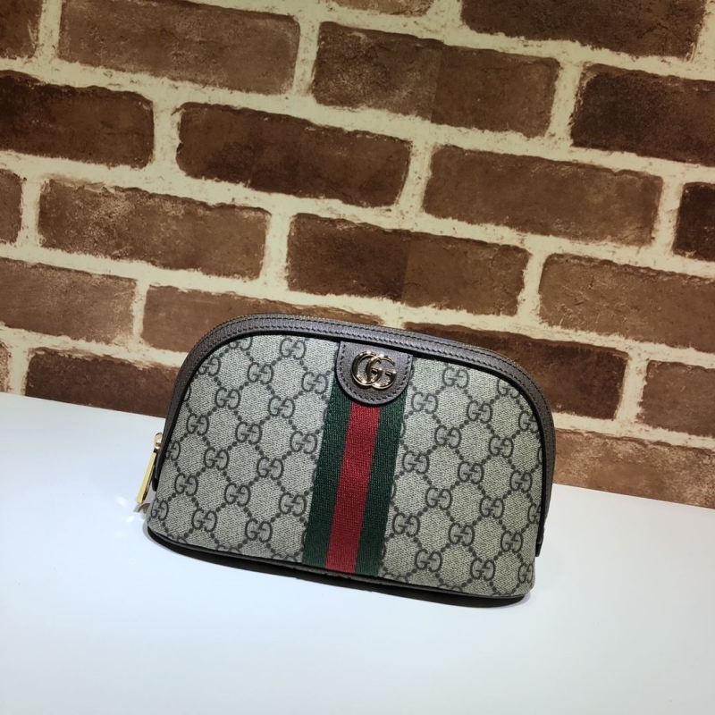G*u*i clutch bags